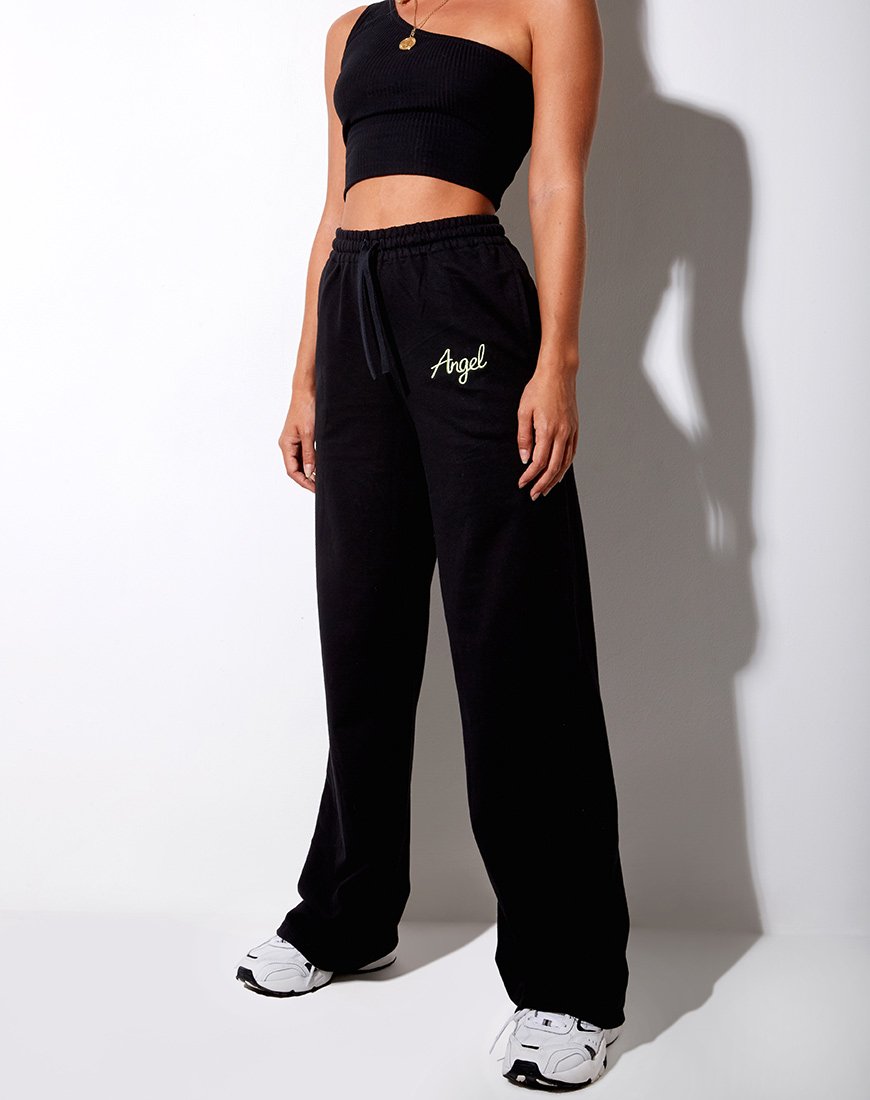 Nattan Jogger en negro 'Angel' Embro en verde neón