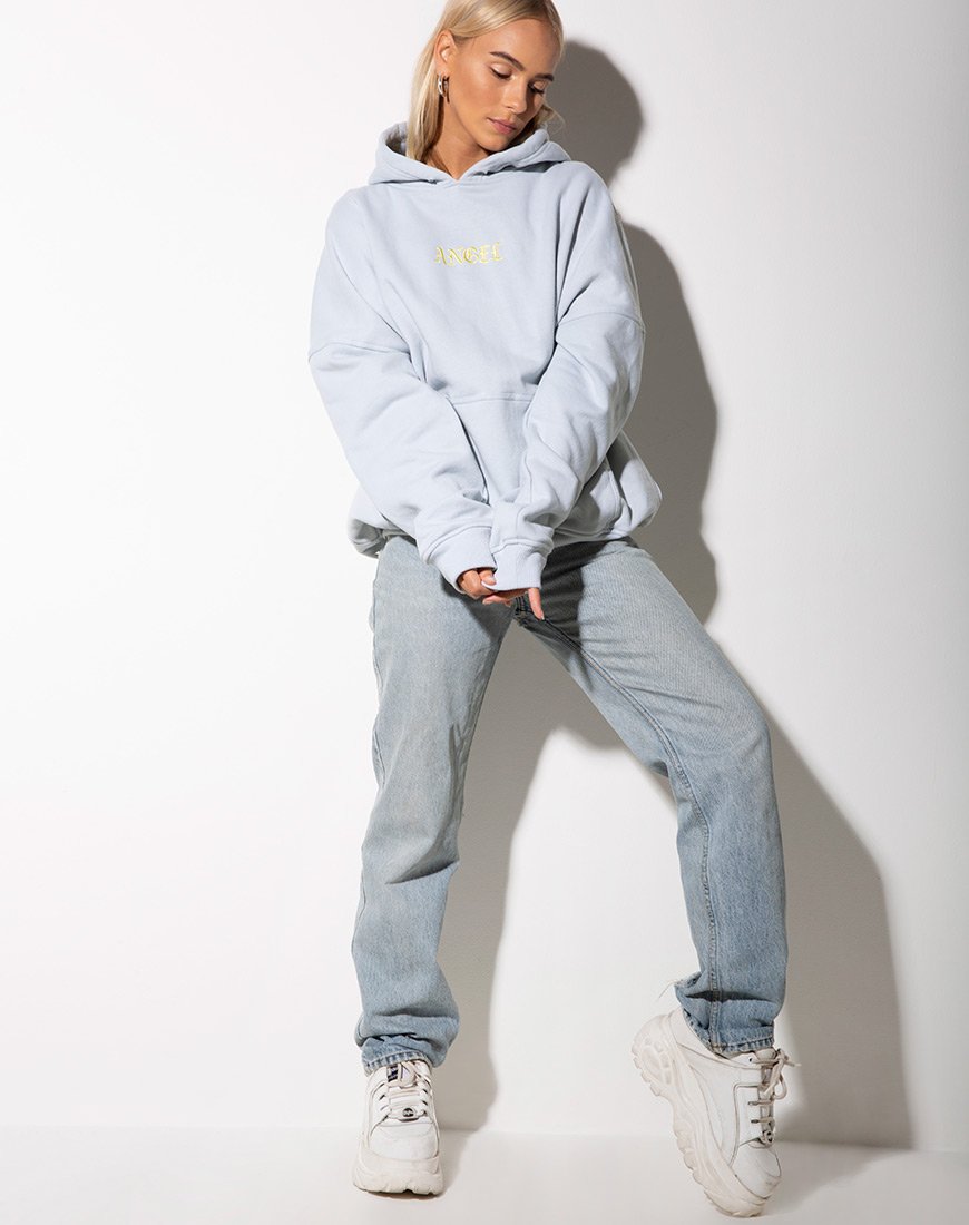 Image of Sudadera oversize con capucha azul bebé y bordado ángel limón
