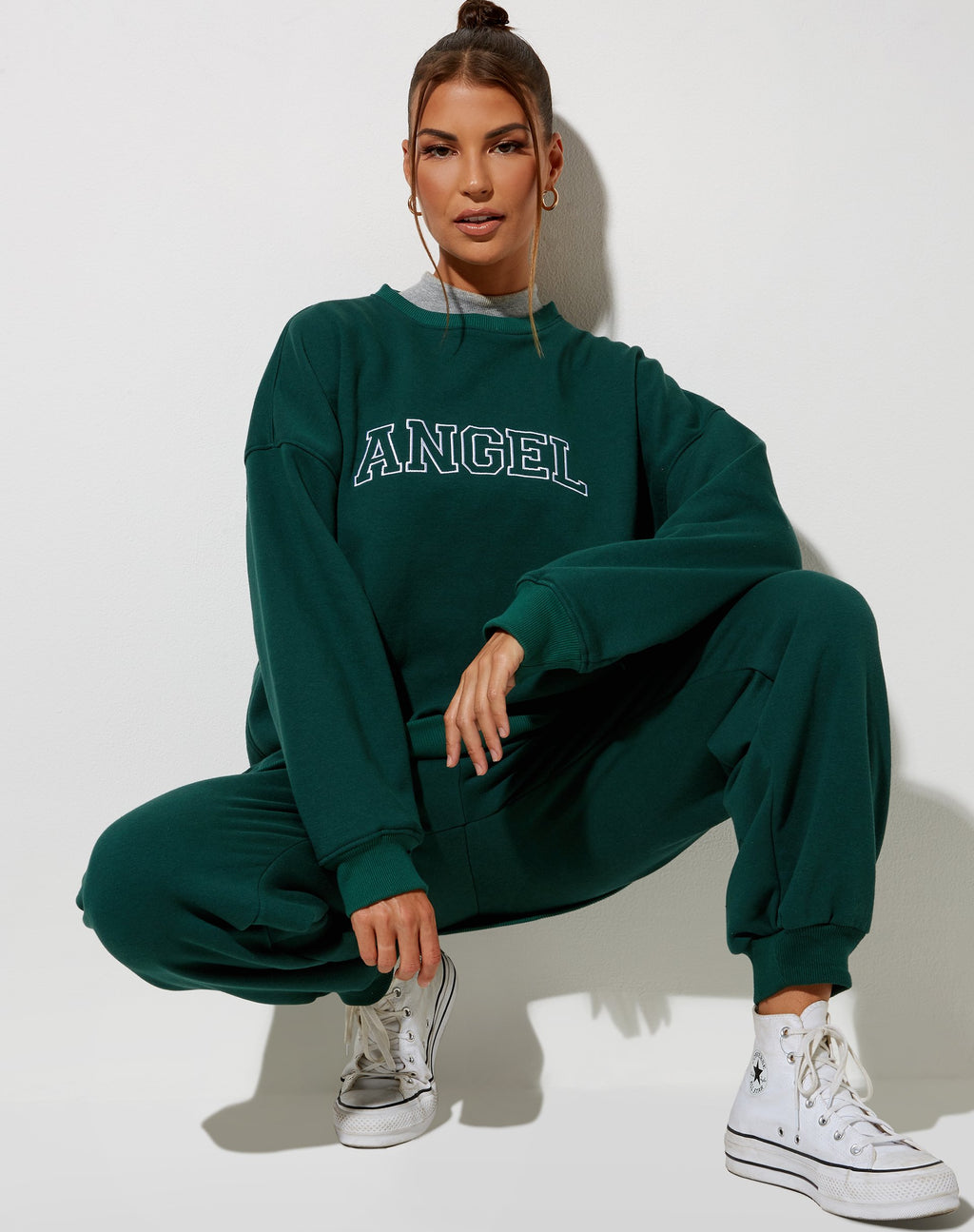 Sudadera Glo en verde botella con bordado "Angel" en blanco