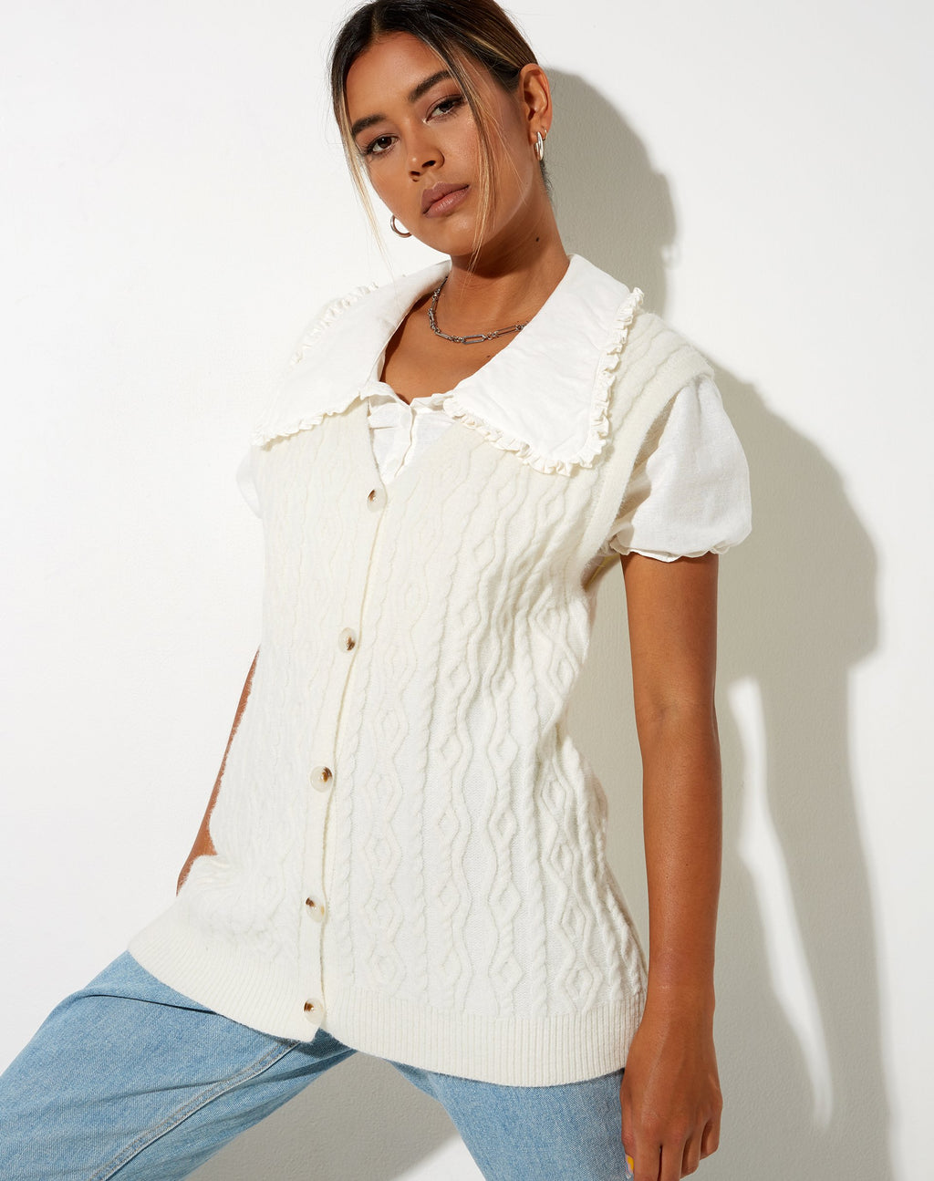 Selvi Cardi en punto marfil