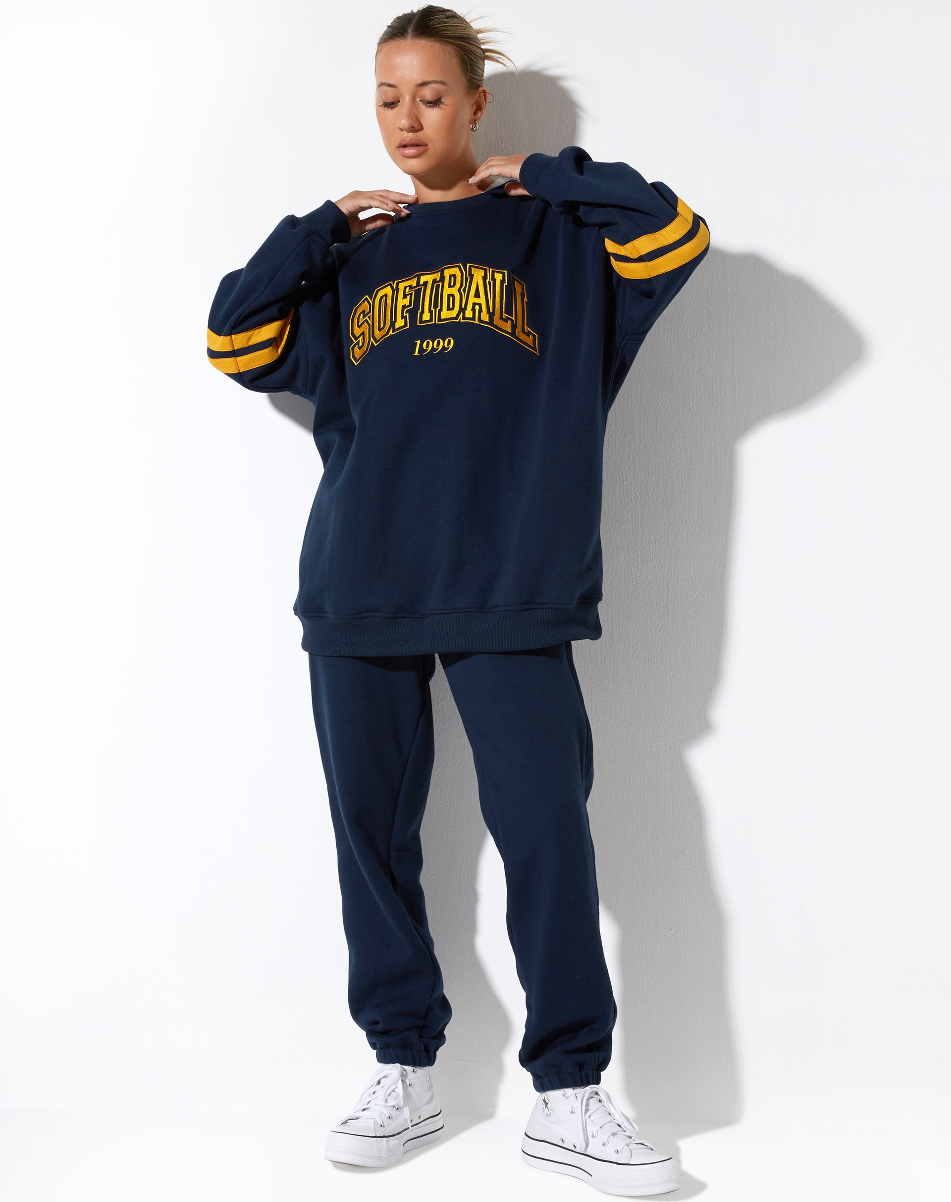 imagen de la sudadera Tim en Navy Citrus Stripe Football 1999