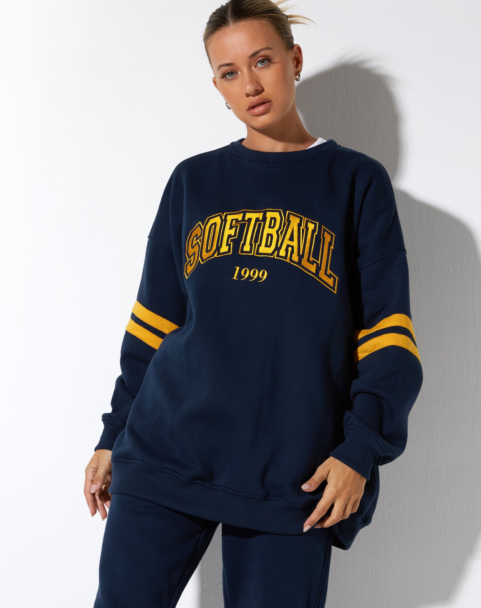 imagen de la sudadera Tim en Navy Citrus Stripe Football 1999