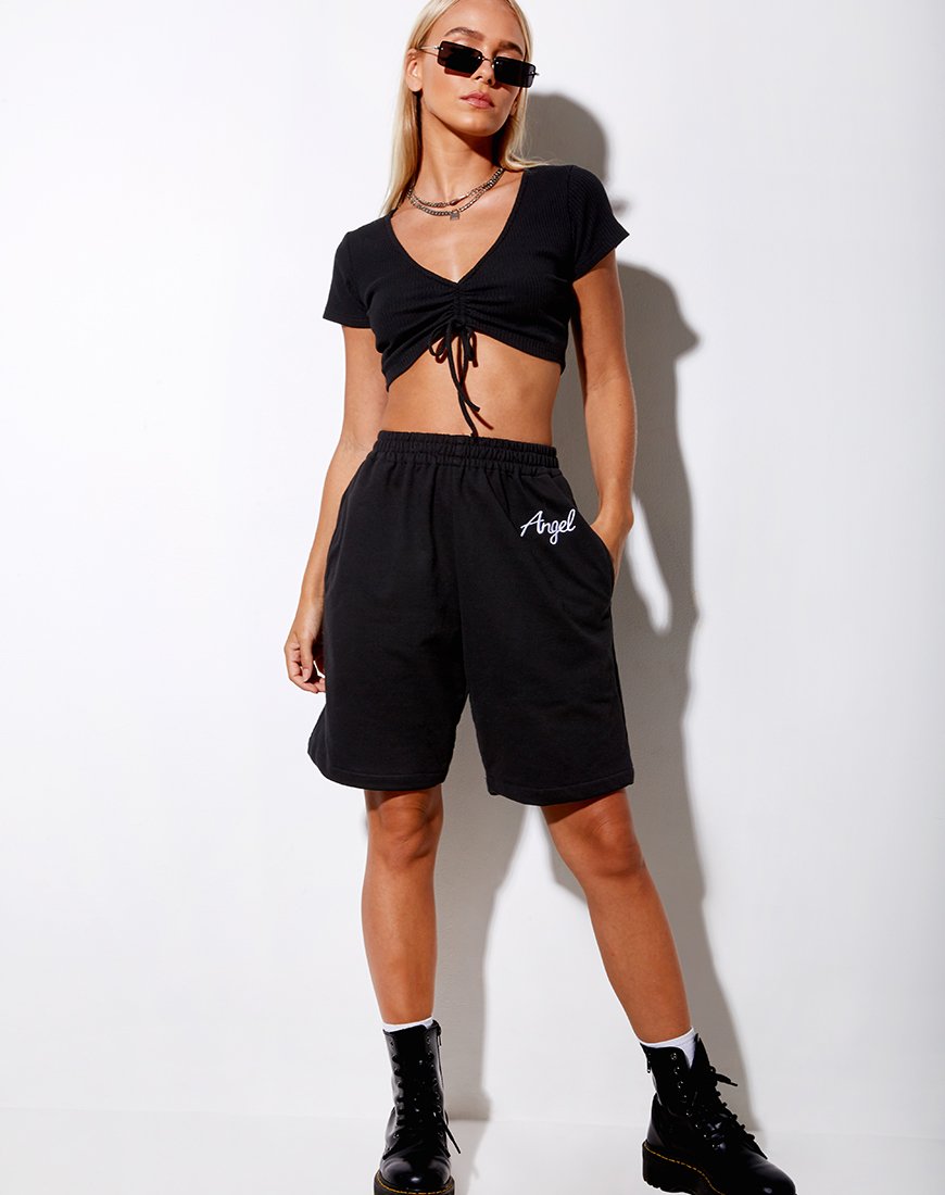 Imagen de Yubi Short en negro Angel Embro en blanco