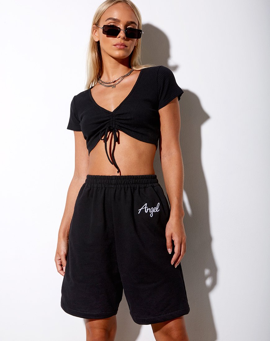Imagen de Yubi Short en negro Angel Embro en blanco