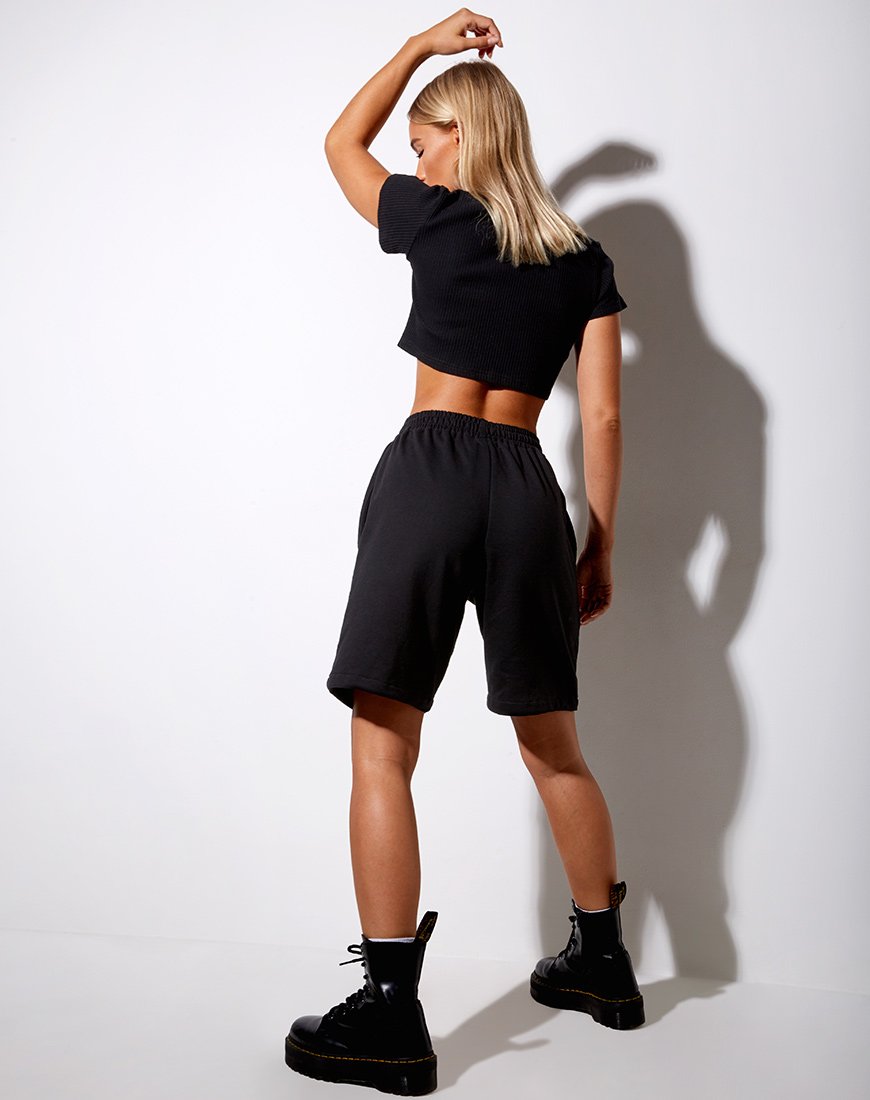 Imagen de Yubi Short en negro Angel Embro en blanco