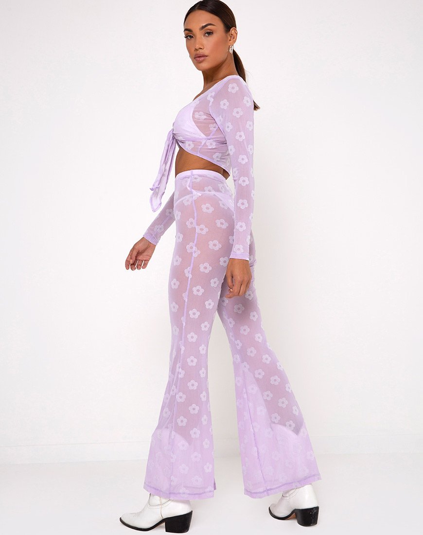 Pantalón Herlom Flare en malla lila y flocado blanco margarita