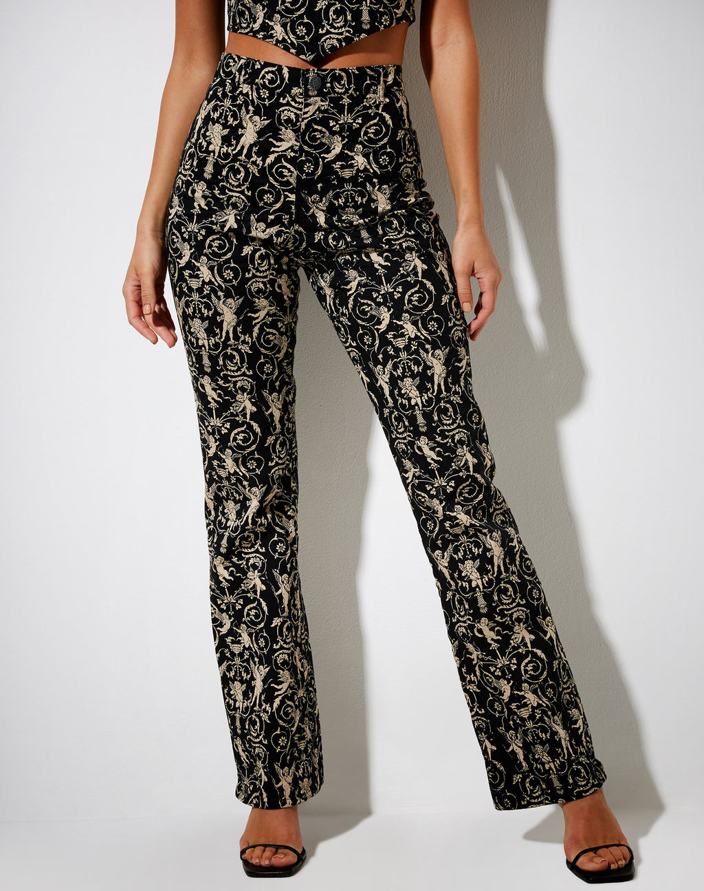Pantalón acampanado Zoven de Querubín barroco negro y dorado